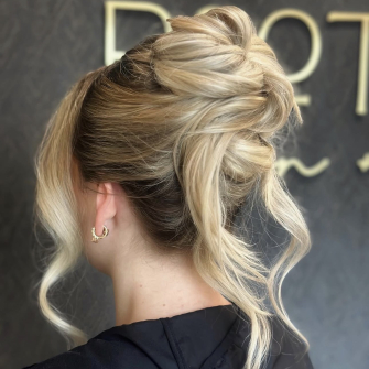 French Twist Bun Variation for Wedding Styled by Rylie