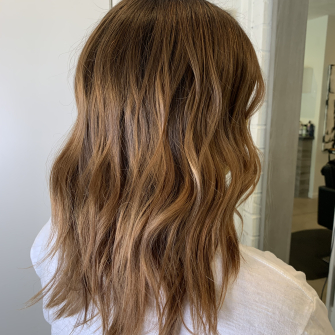 Medium length hair cut and styled by Emma