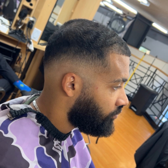 Fade and beard trim by eric