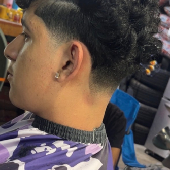 Curly textured length to fade