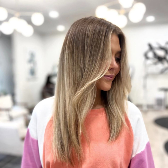 Long haired blonde soft cut and color by Meg