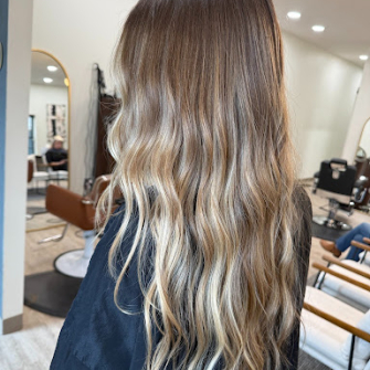 Blonde long hair with highlights by Rowan