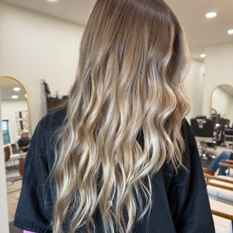 Blonde cut and color by Rowan 
